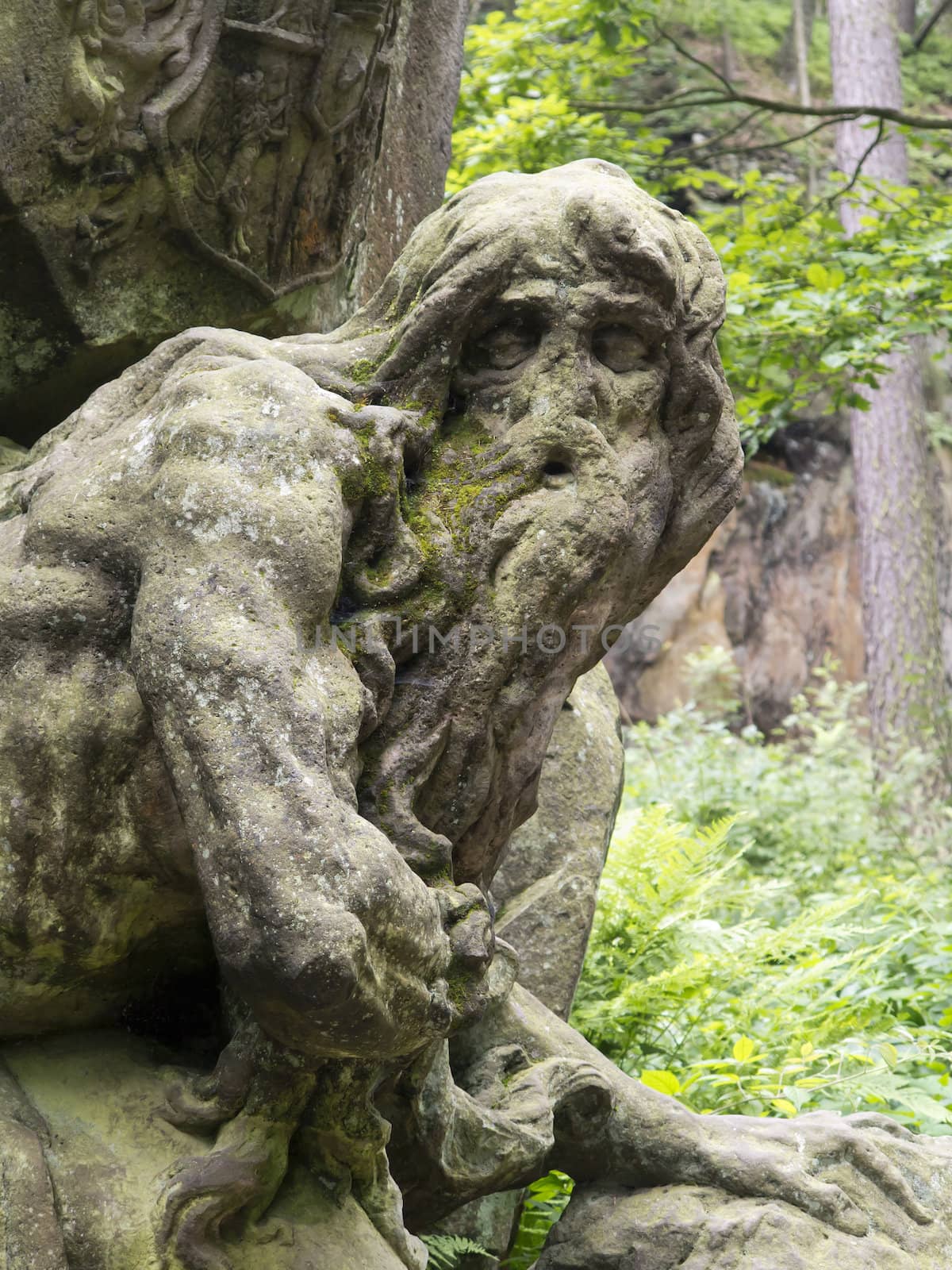 Kuks Forest Sculptures - Hermit Juan Garin - detail of the Baroque sculpture by Matthias Bernard Braun in the Bethlehem of Braun, Kuks, Czech Republic. The Bethlehem of Braun (Czech: Braunuv Betlem) is a complex of Baroque statues and relieves carved by famous sculptor Matthias Bernard Braun directly in sandstone rocks in the forest near complex Kuks Hospital in Northern Bohemia, Czech Republic. Part of the sculptures in the New Forest is ranked the best works of Czech Baroque sculpture. Since 2002, the area is protected as a National Historic Landmark and were listed in the 2000 World Monuments Watch by the World Monuments Fund.