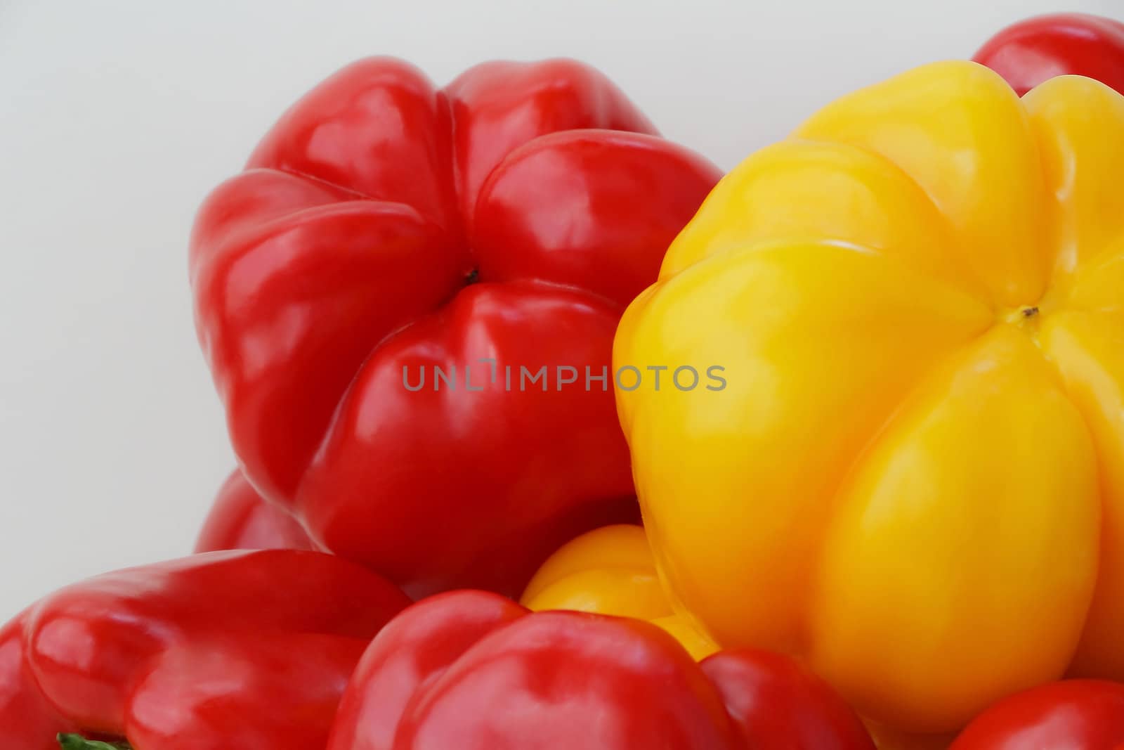Image of red and yellow raw pepper