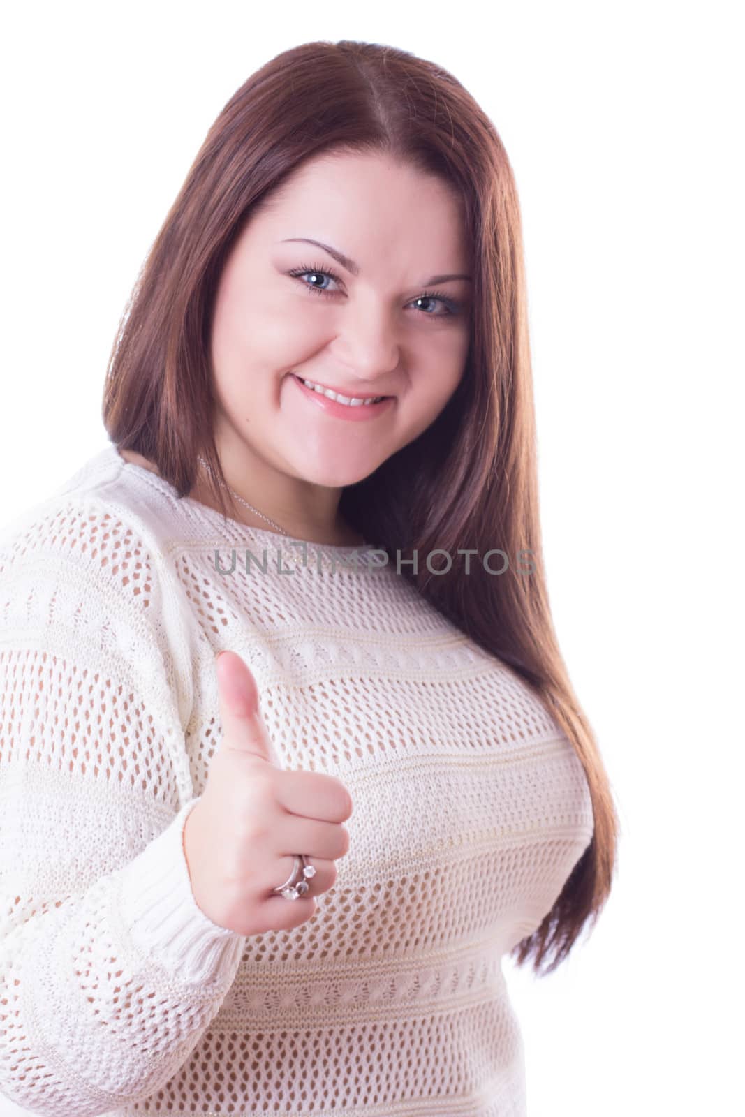Smiling girl with thumb up on white isolated background