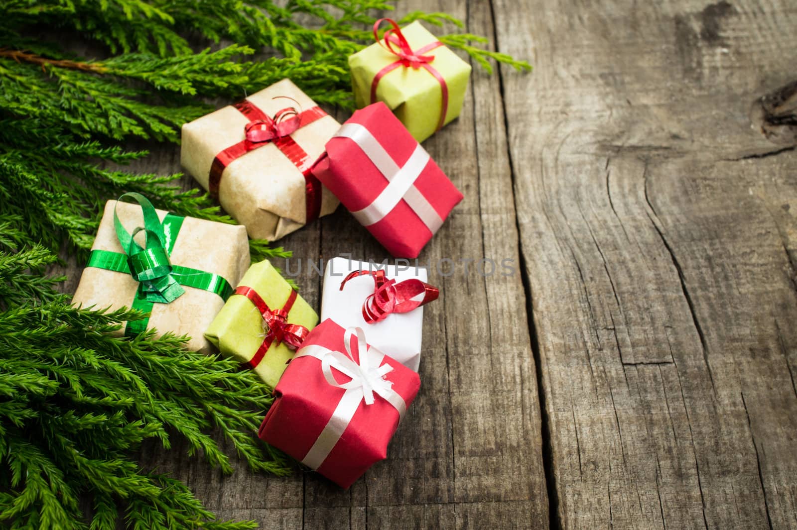 Christmas Decoration with presents on wood textured background. 