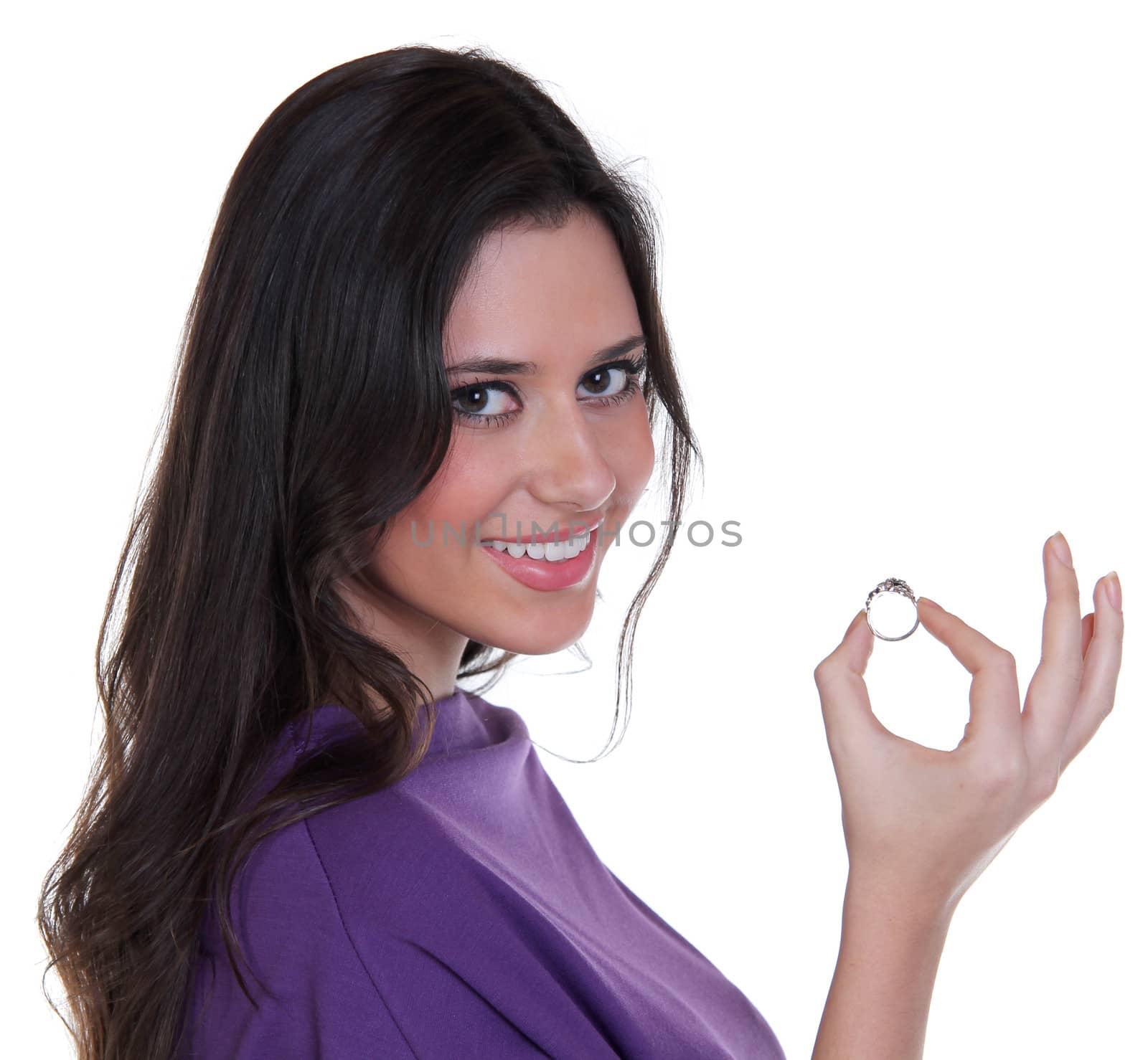 Young beautiful woman showing her engagement ring