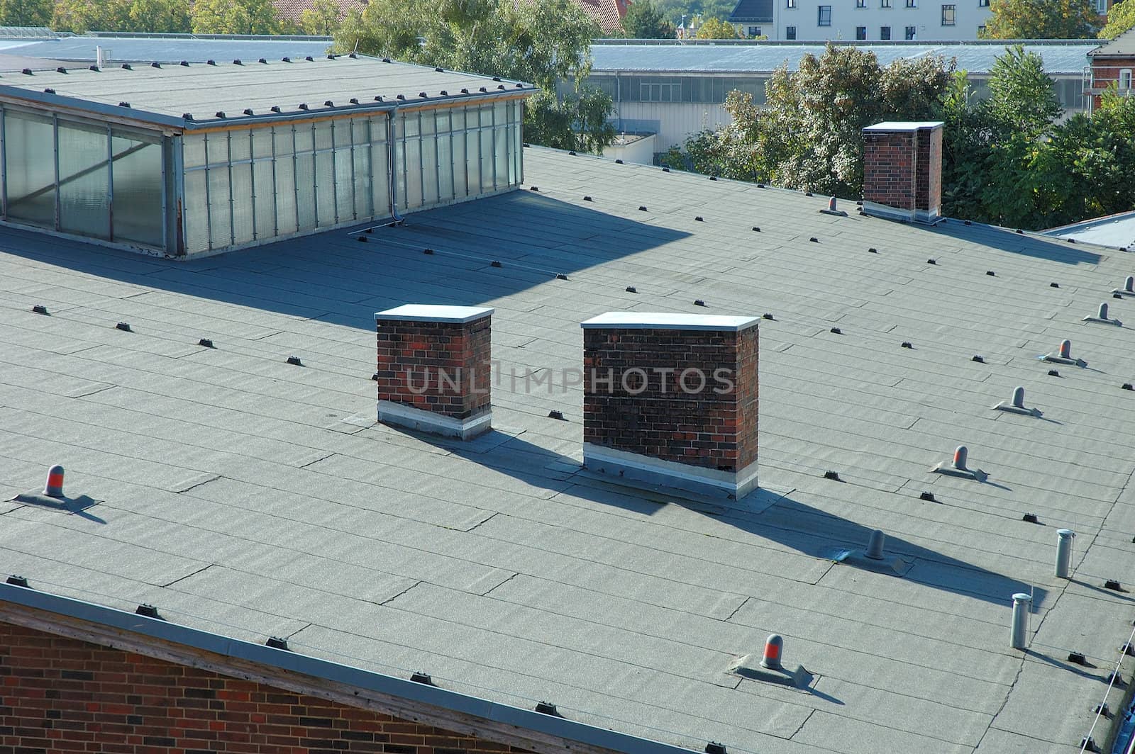 Industrial building's roof covered with roofing paper