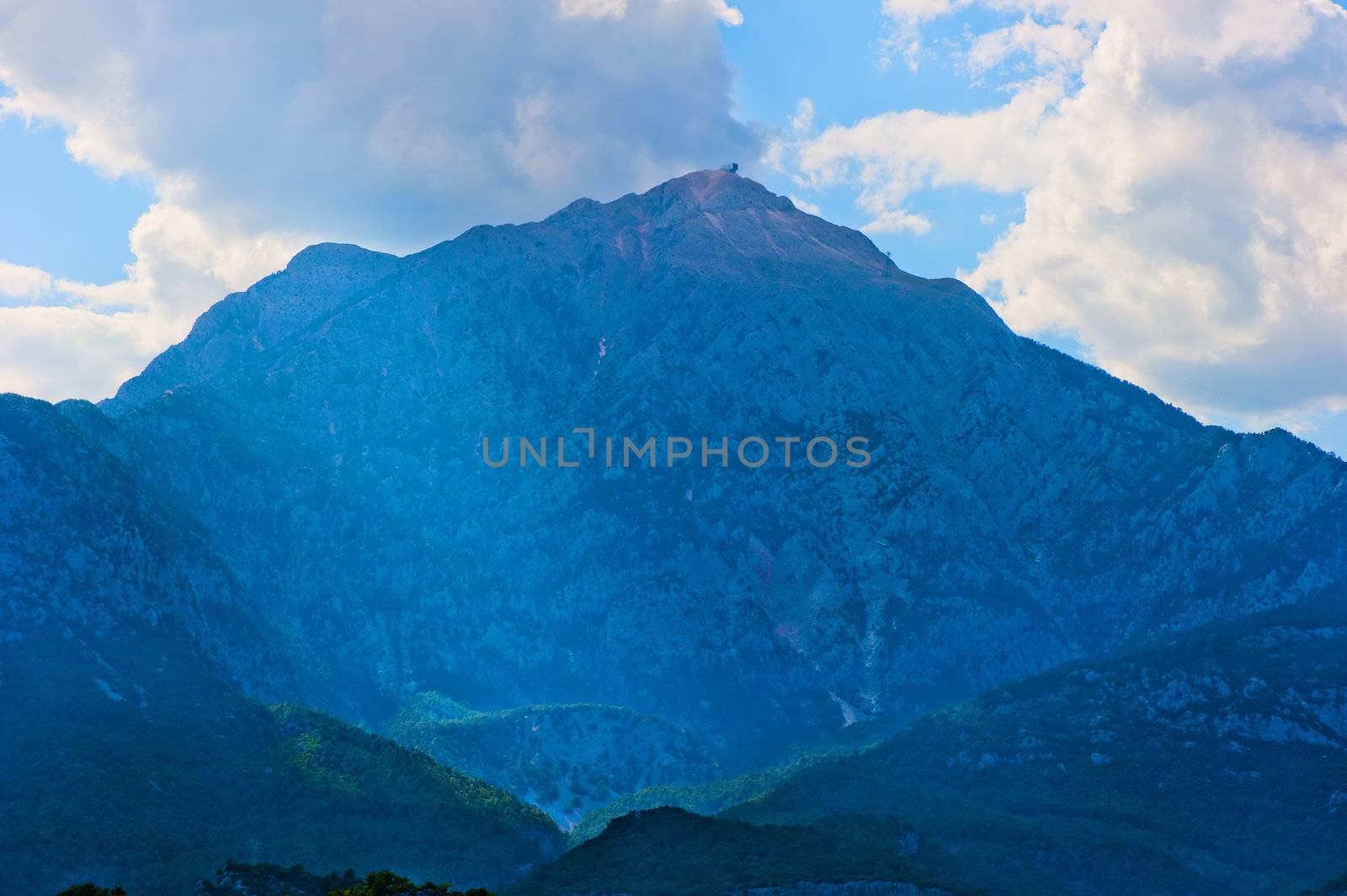 beautiful mountain peak in blue against the sky by kosmsos111