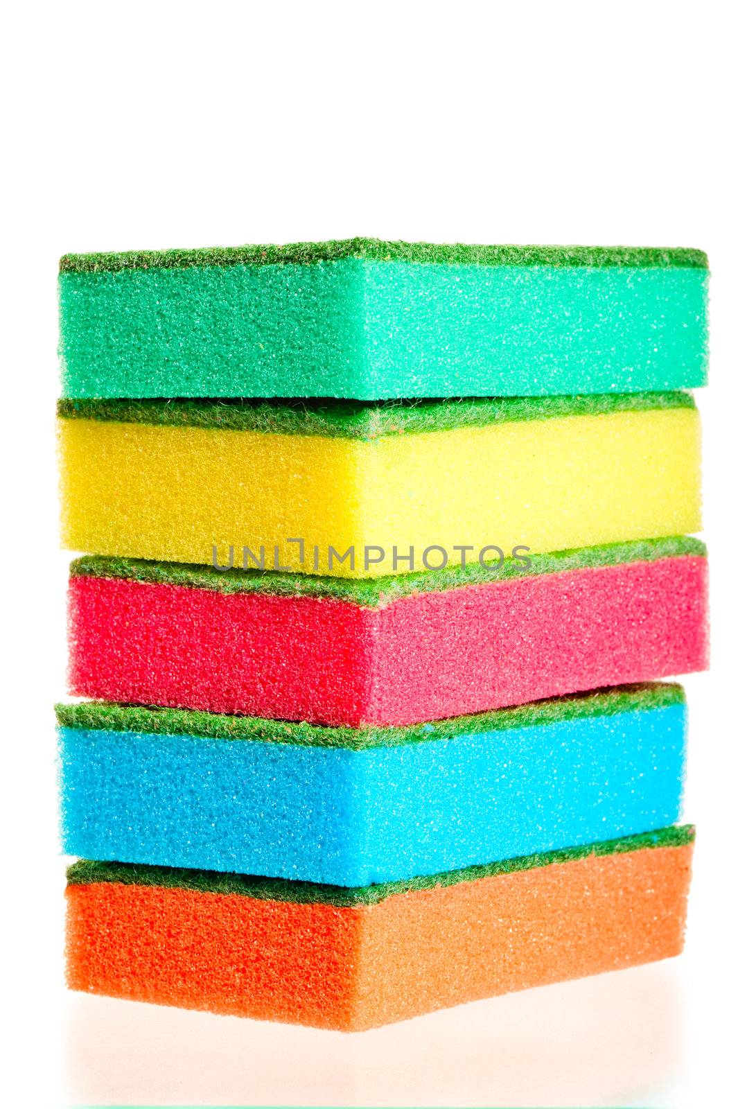 tower of colorful sponges for ware on a white background by kosmsos111