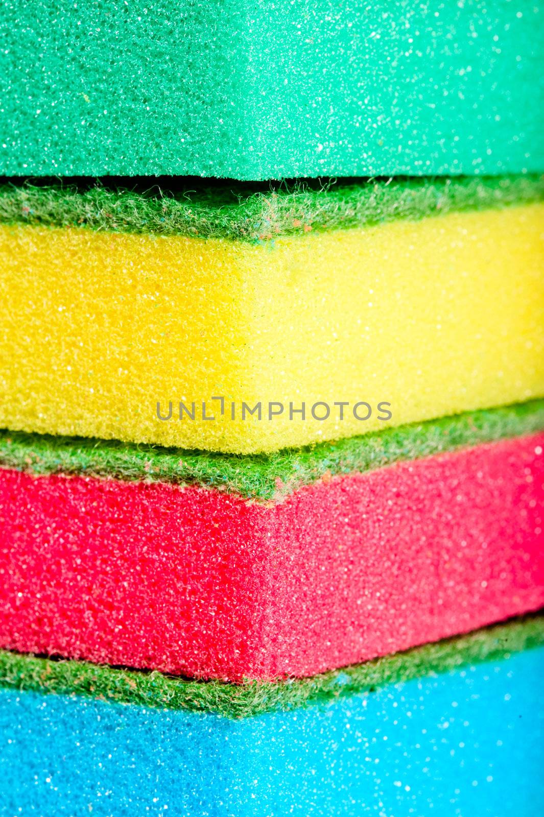 close-up sponges for washing dishes on a white background