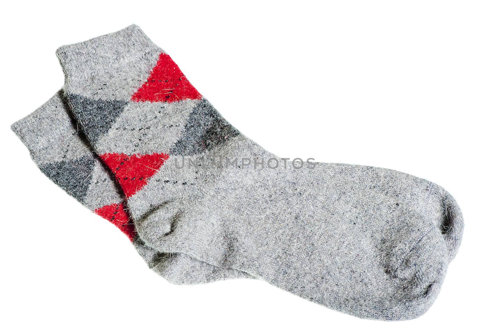 knitted warm winter socks on a white background