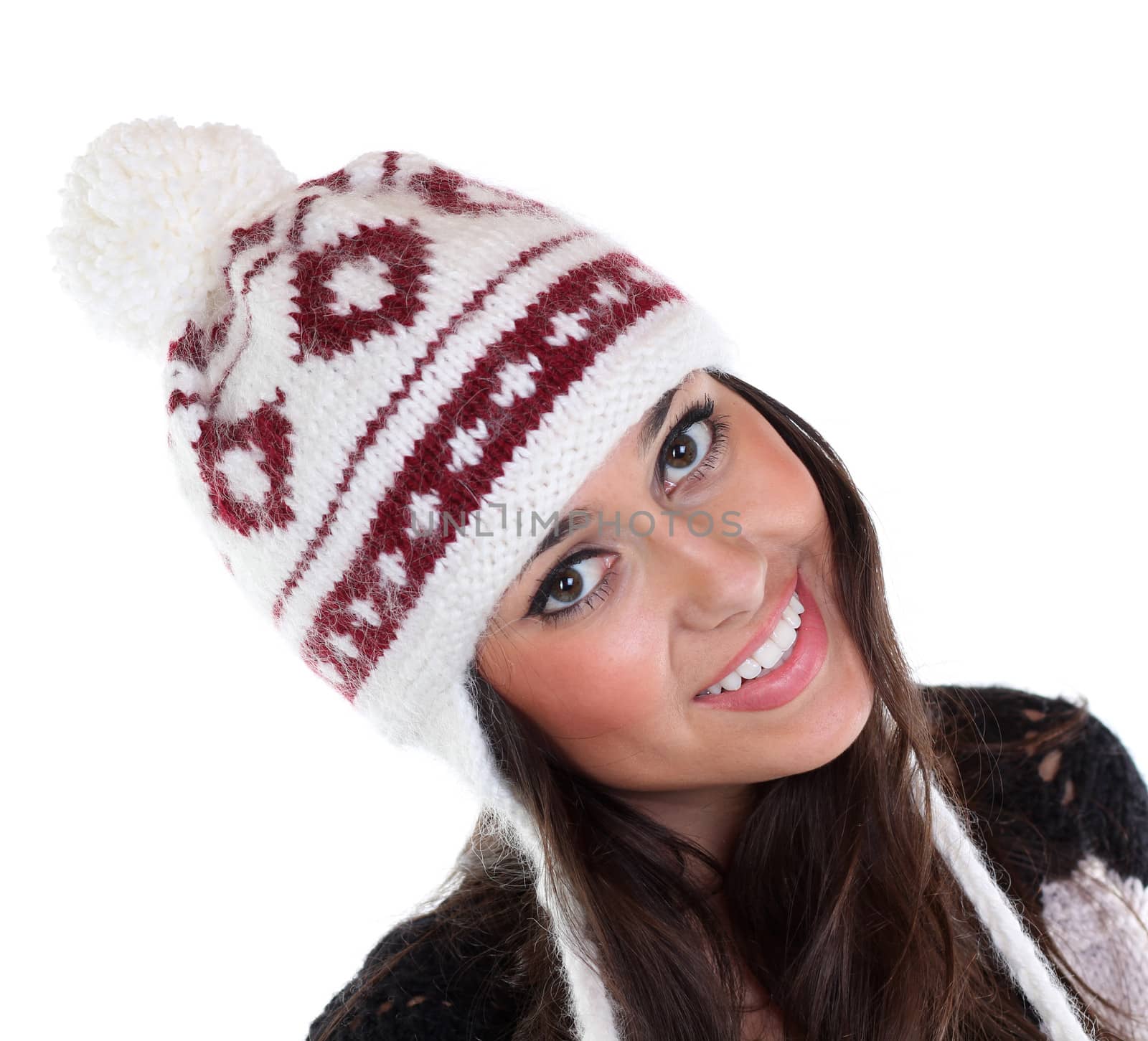 young happy woman in a knitted hat