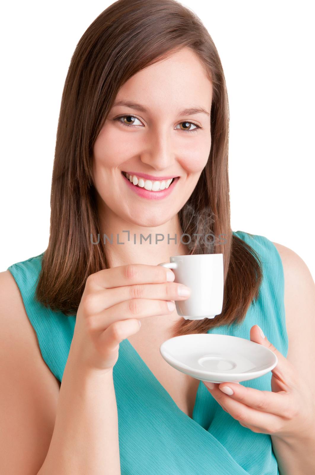 Young woman drinking a hot coffee from a white cup, isolated in white