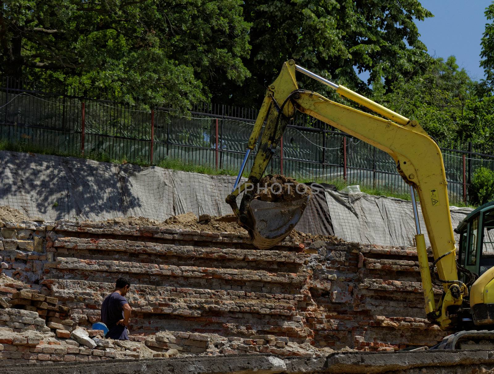 the excavator working on a construction site