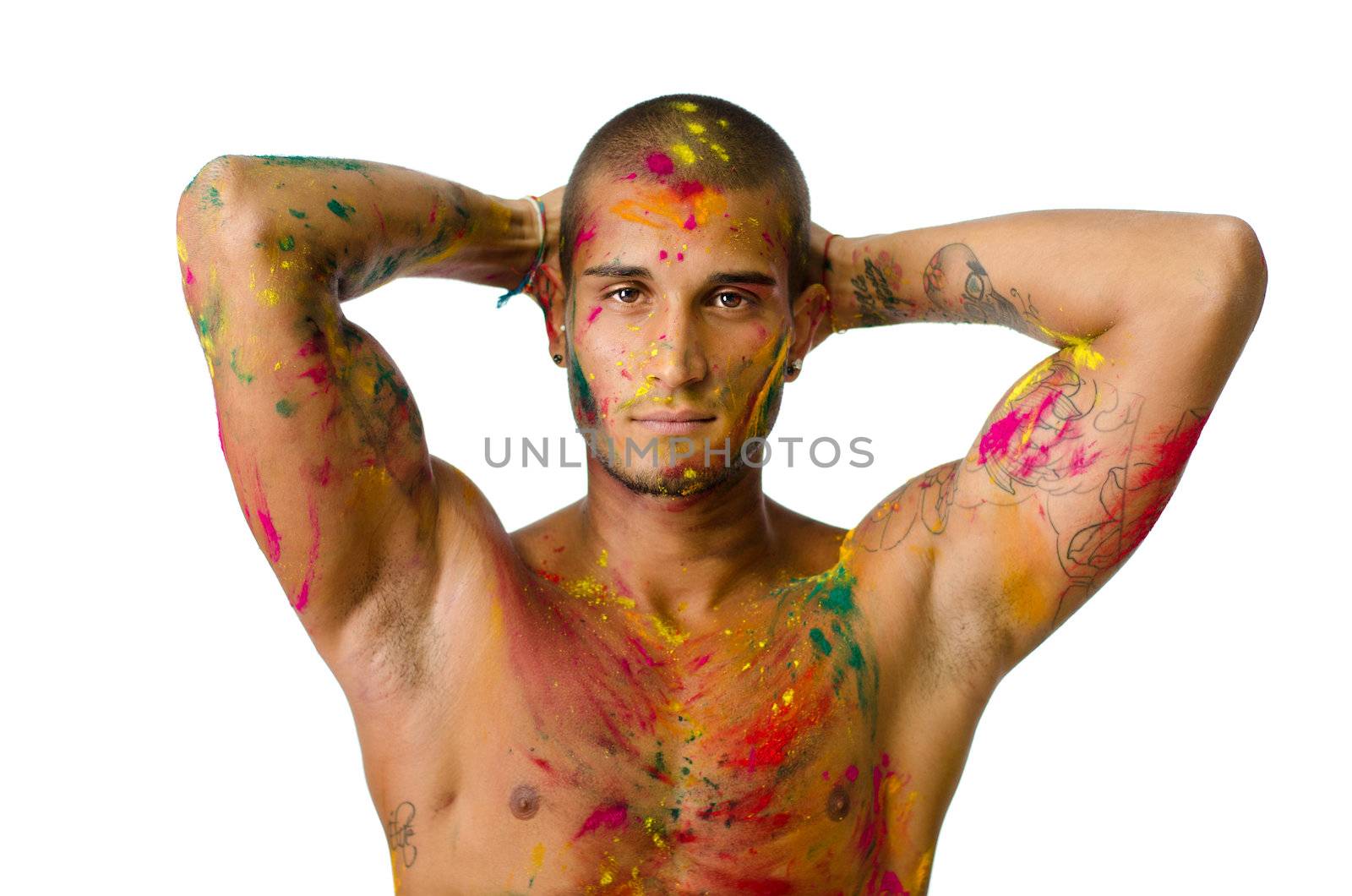 Attractive young man shirtless, skin painted all over with bright colors by artofphoto