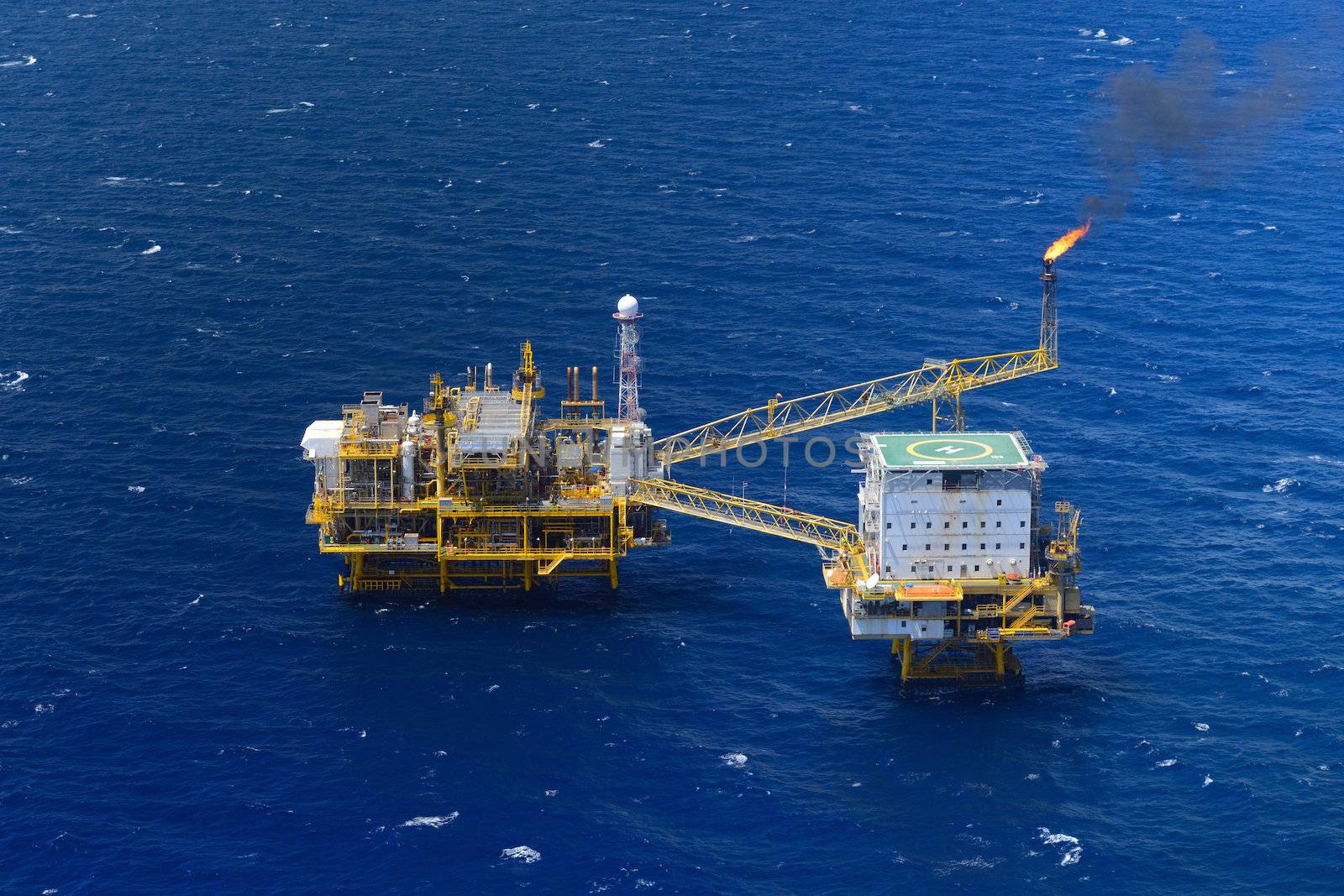 the top view offshore oil rig platform take from aircraft