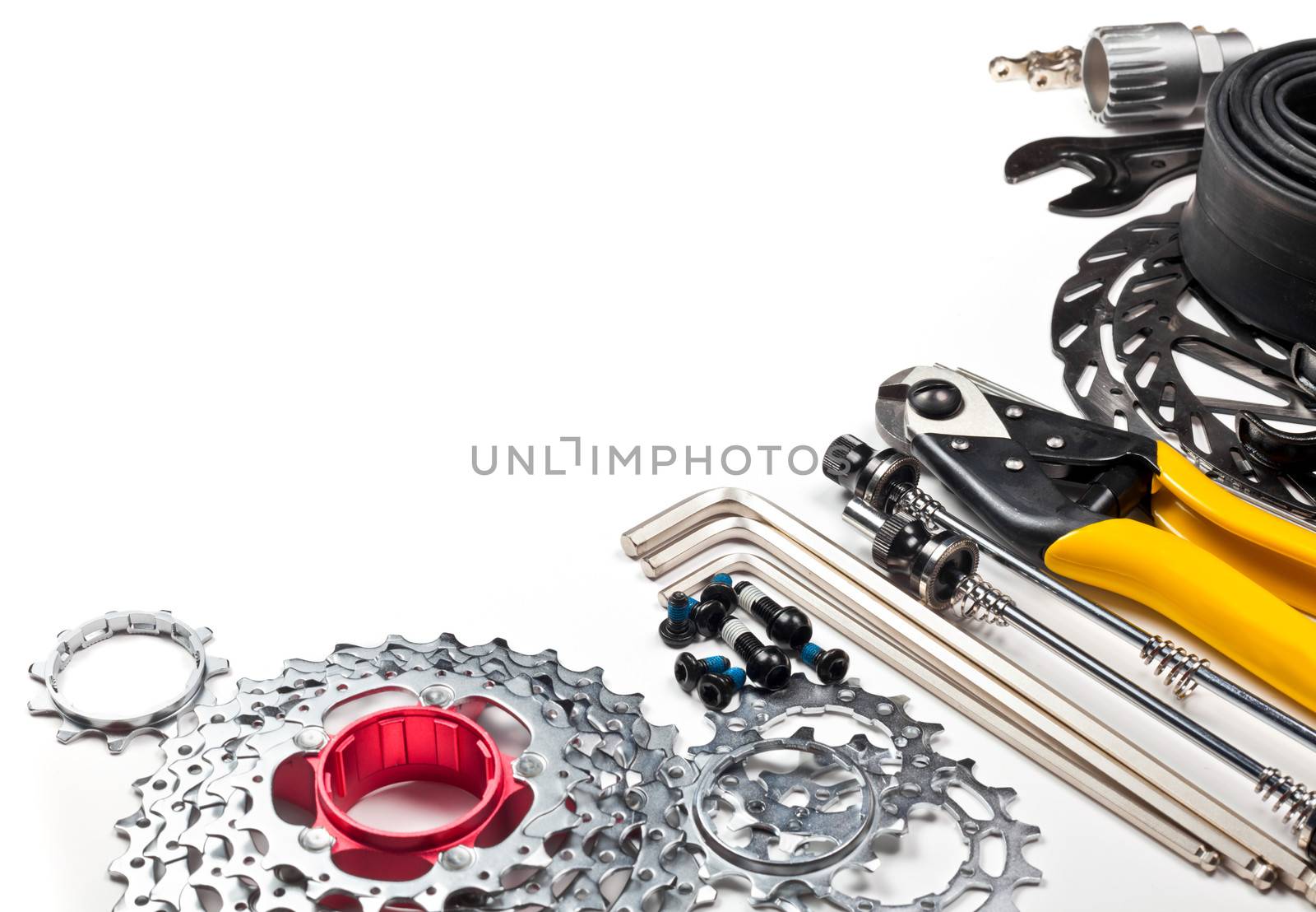 Mountain bike tools and spares on white background