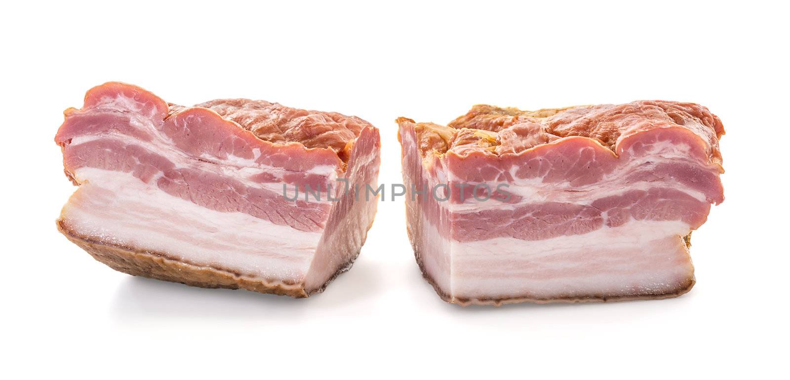 Closeup of Two Big Cuts of Smoked Bacon over White Background, shallow focus, horizontal shot