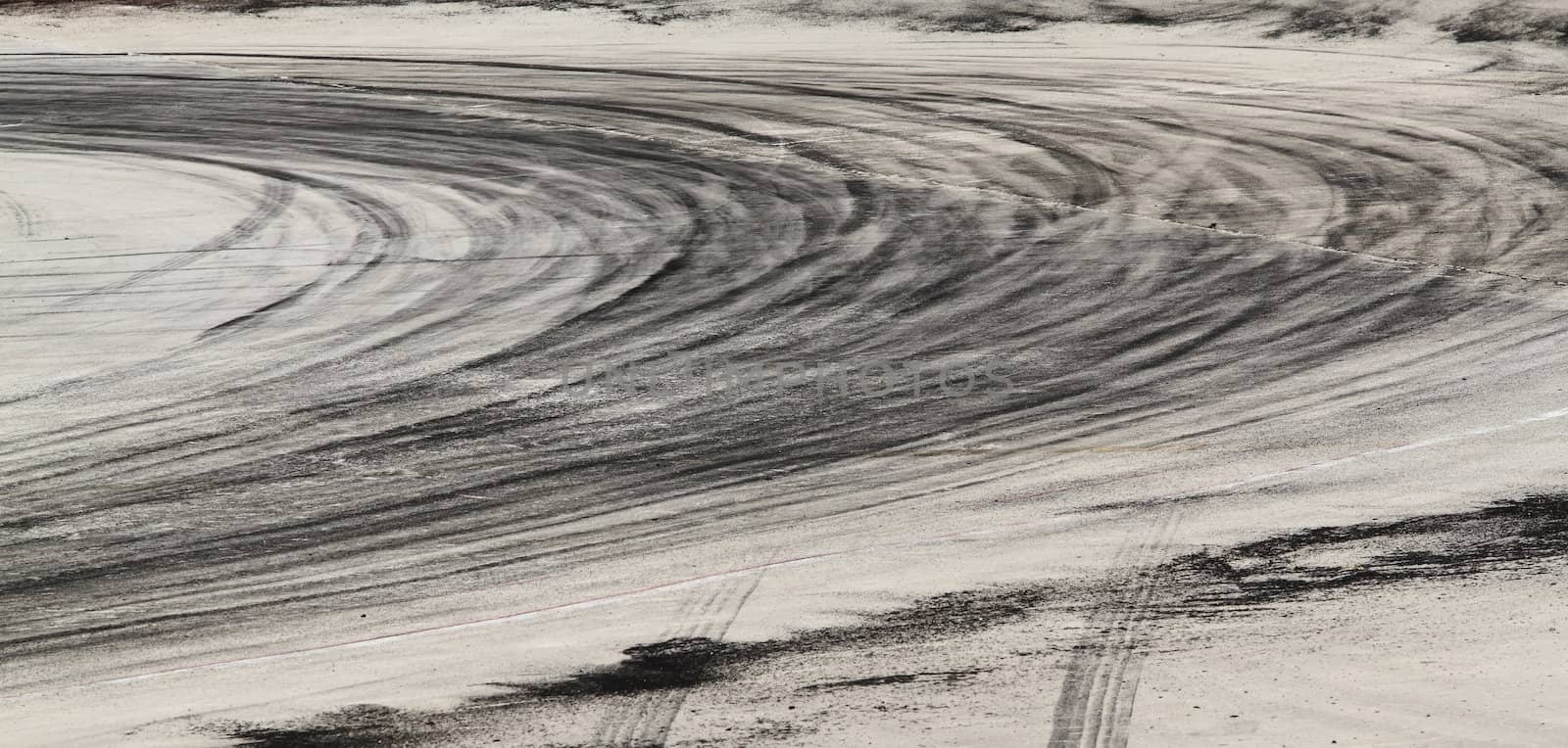 Background with tire marks on road track