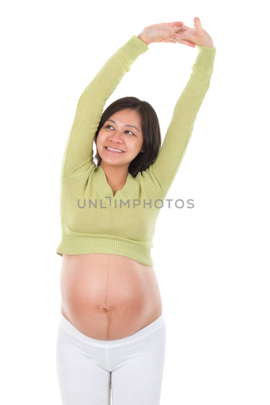 Maternity health concept. Asian pregnant woman arms stretching isolated on white background.