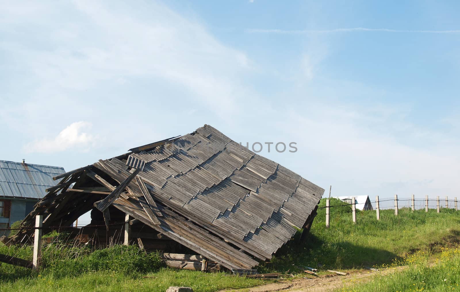 The old thrown house in village in the spring. 