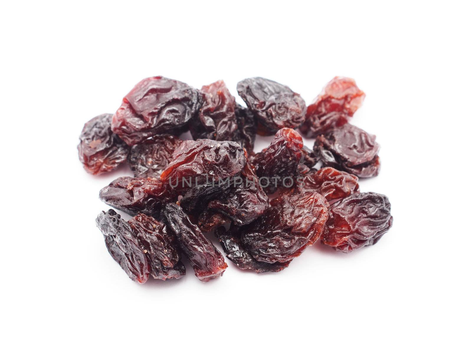 Raisins on the white background