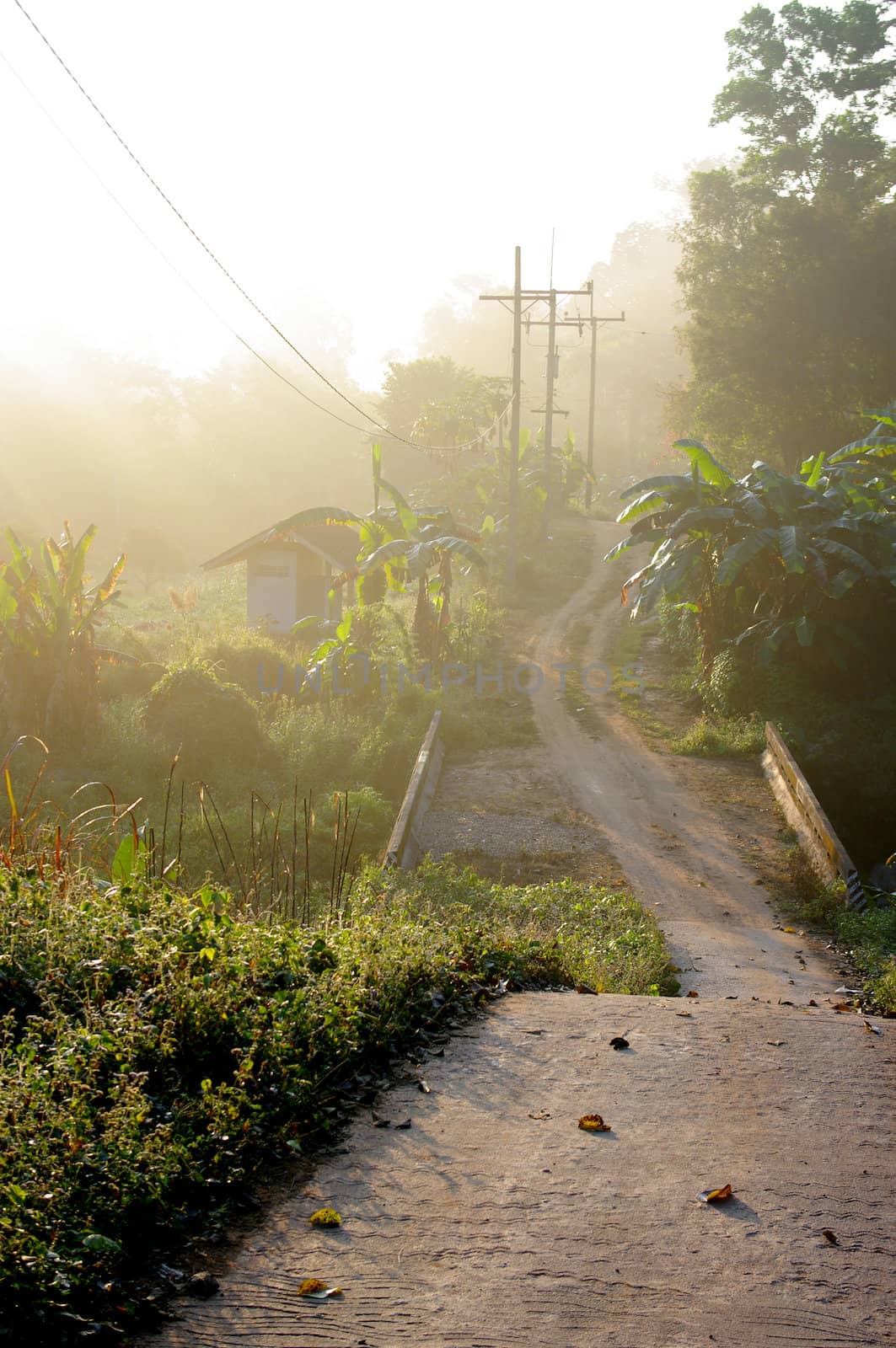 Urban road with morning light at Chiang Rai, Thailand