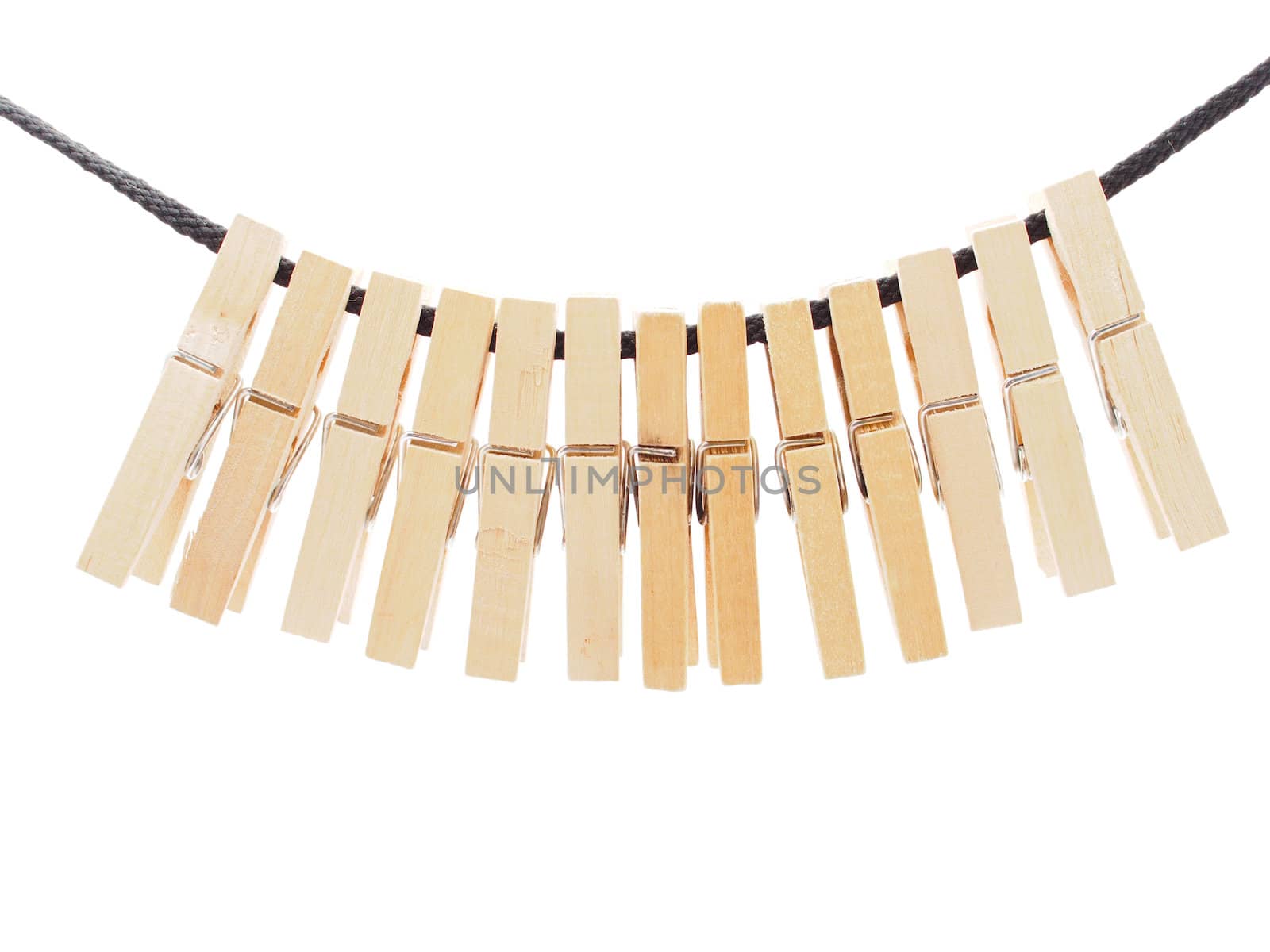 Clothespins and rope on a white background 