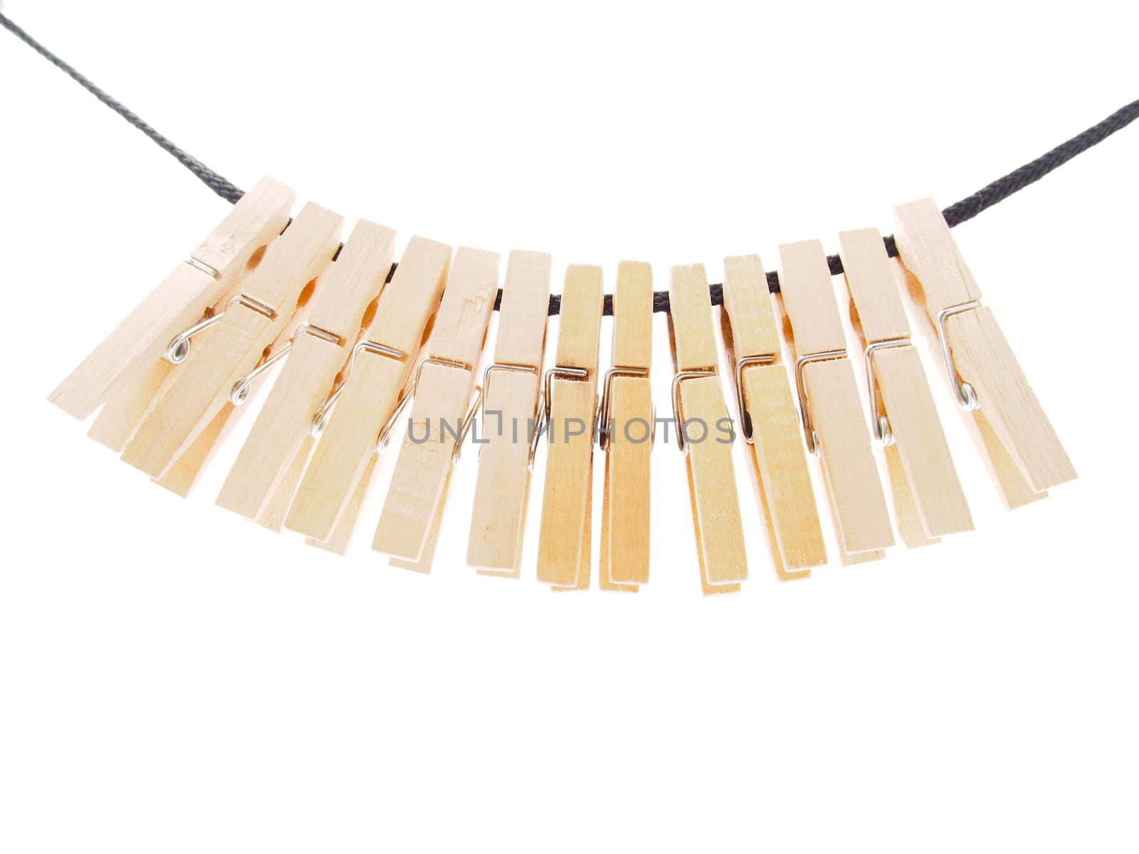 Clothespins and rope on a white background 
