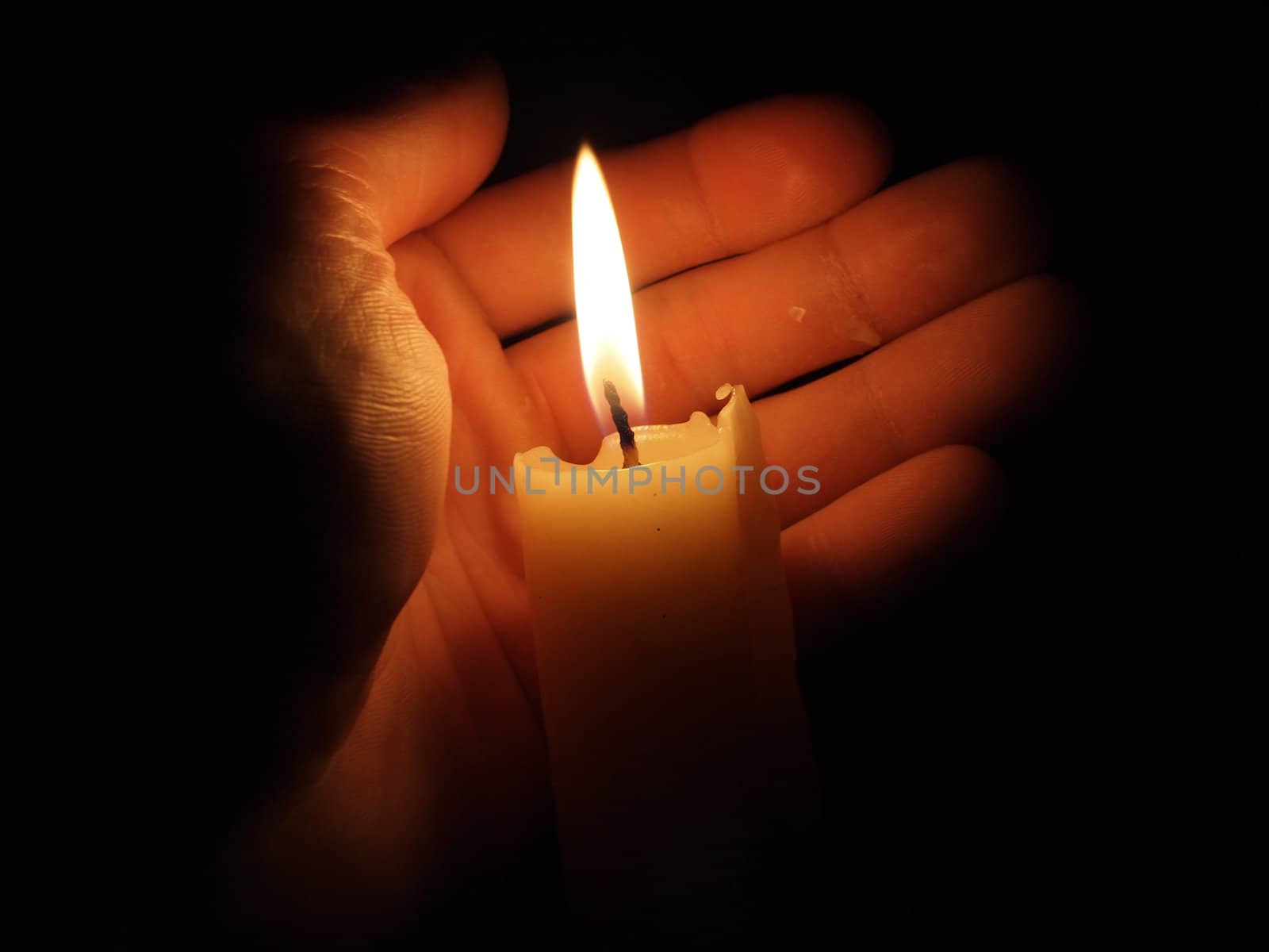 hand with candle