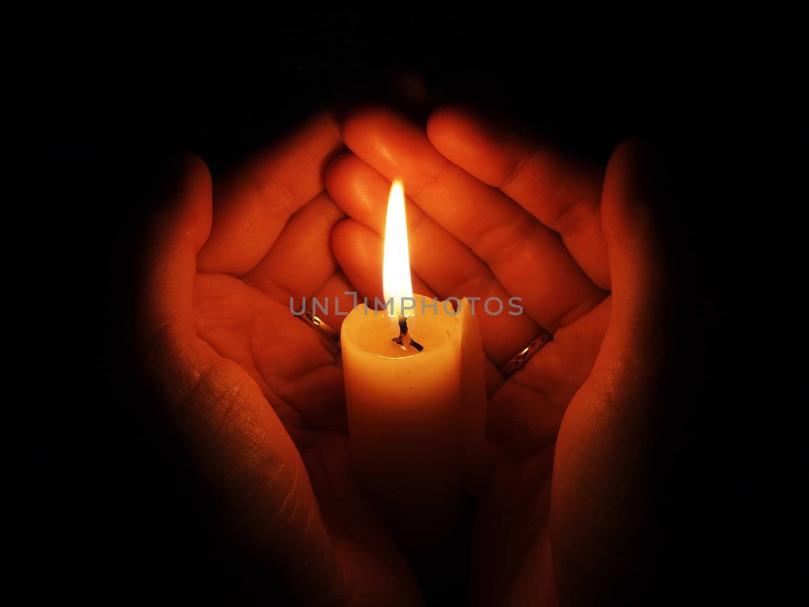 hand with candle