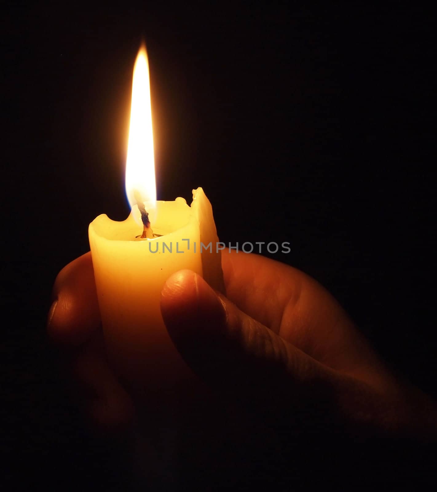 hand with candle