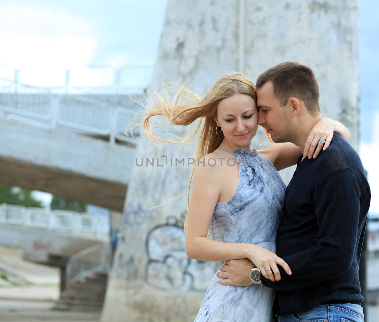 loving couple says goodbye to the river station