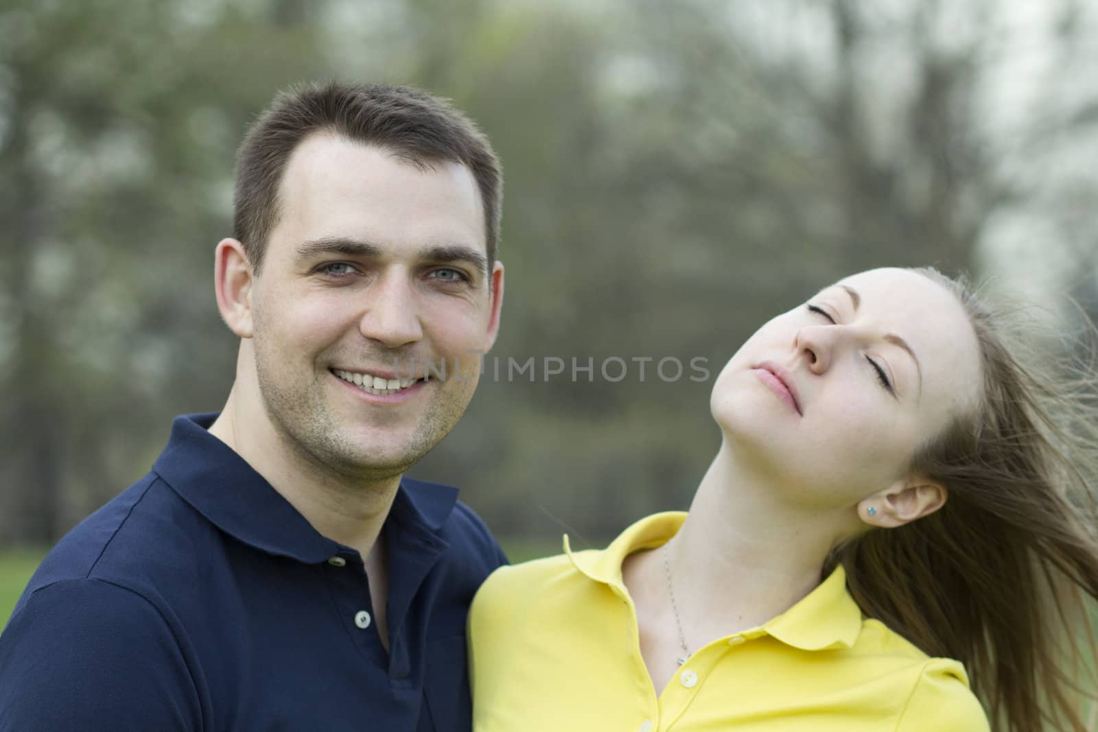 Portrait of love couple embracing outdoor