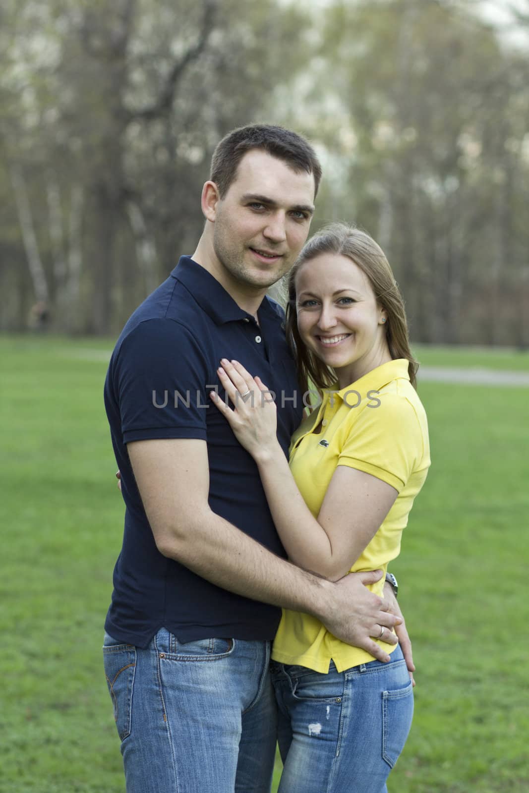 Portrait of love couple embracing outdoor