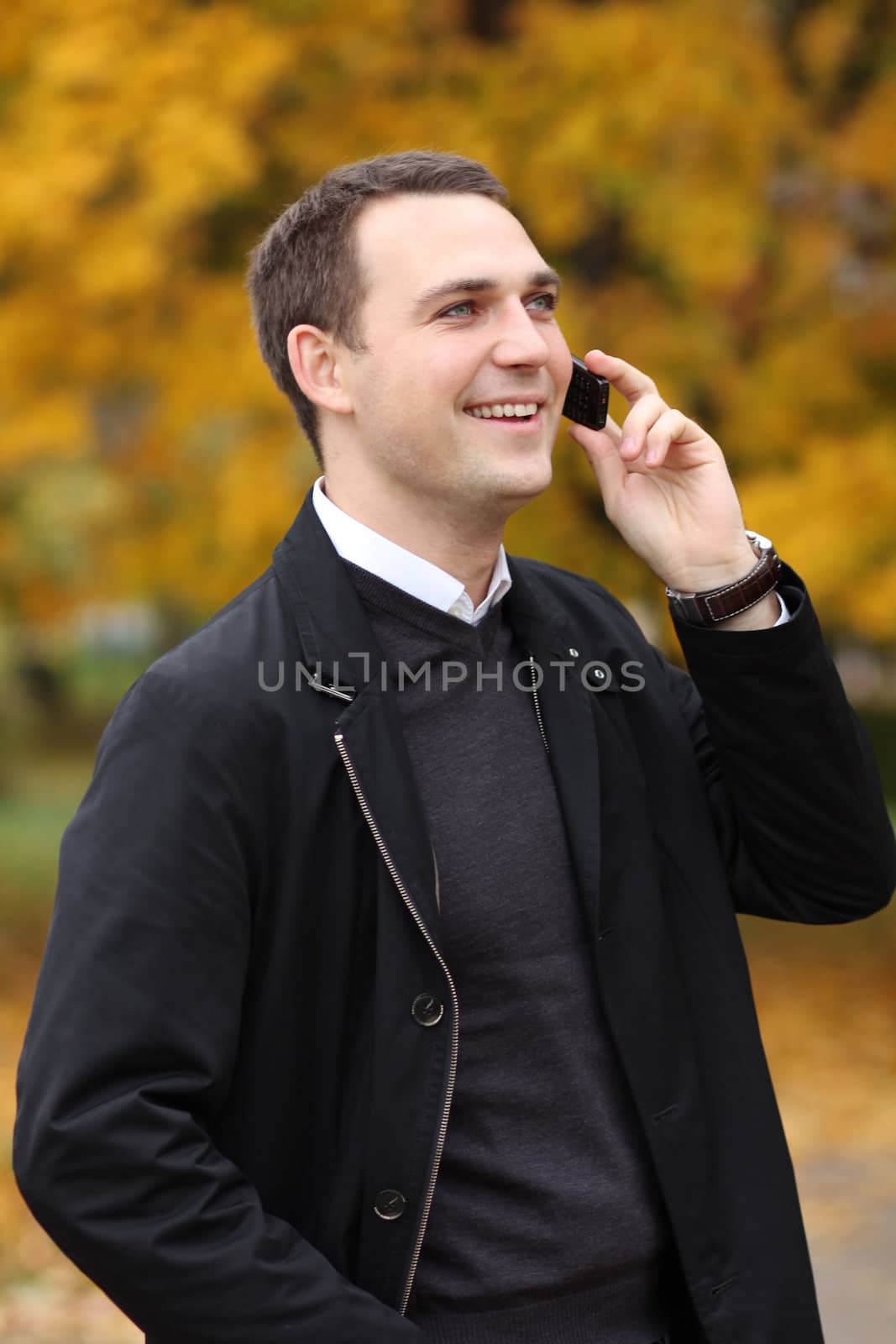 Portrait of young attractive man, outdoors