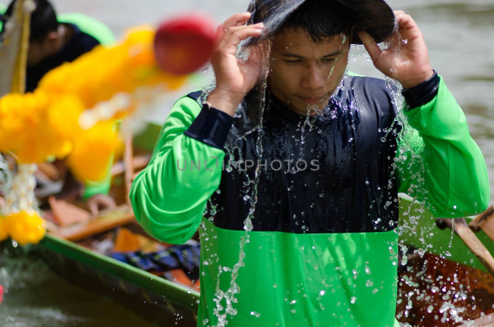 Petchaburi, THAILAND - October 7 : Participants in the Petchaburi Long Boat Competition 2012 on October 7, 2012 in The Petchaburi river ,Petchaburi Province, Thailand. 