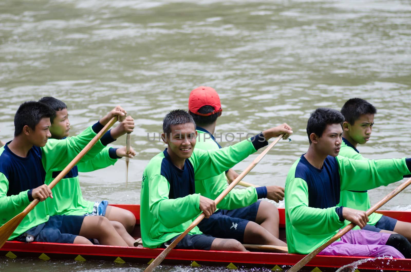 Petchaburi, THAILAND - October 7 : Participants in the Petchaburi Long Boat Competition 2012 on October 7, 2012 in The Petchaburi river ,Petchaburi Province, Thailand. 