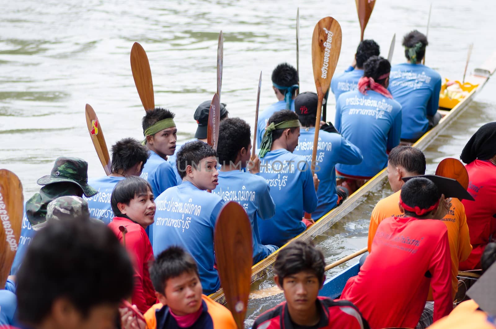 Petchaburi, THAILAND - October 7 : Participants in the Petchaburi Long Boat Competition 2012 on October 7, 2012 in The Petchaburi river ,Petchaburi Province, Thailand. 