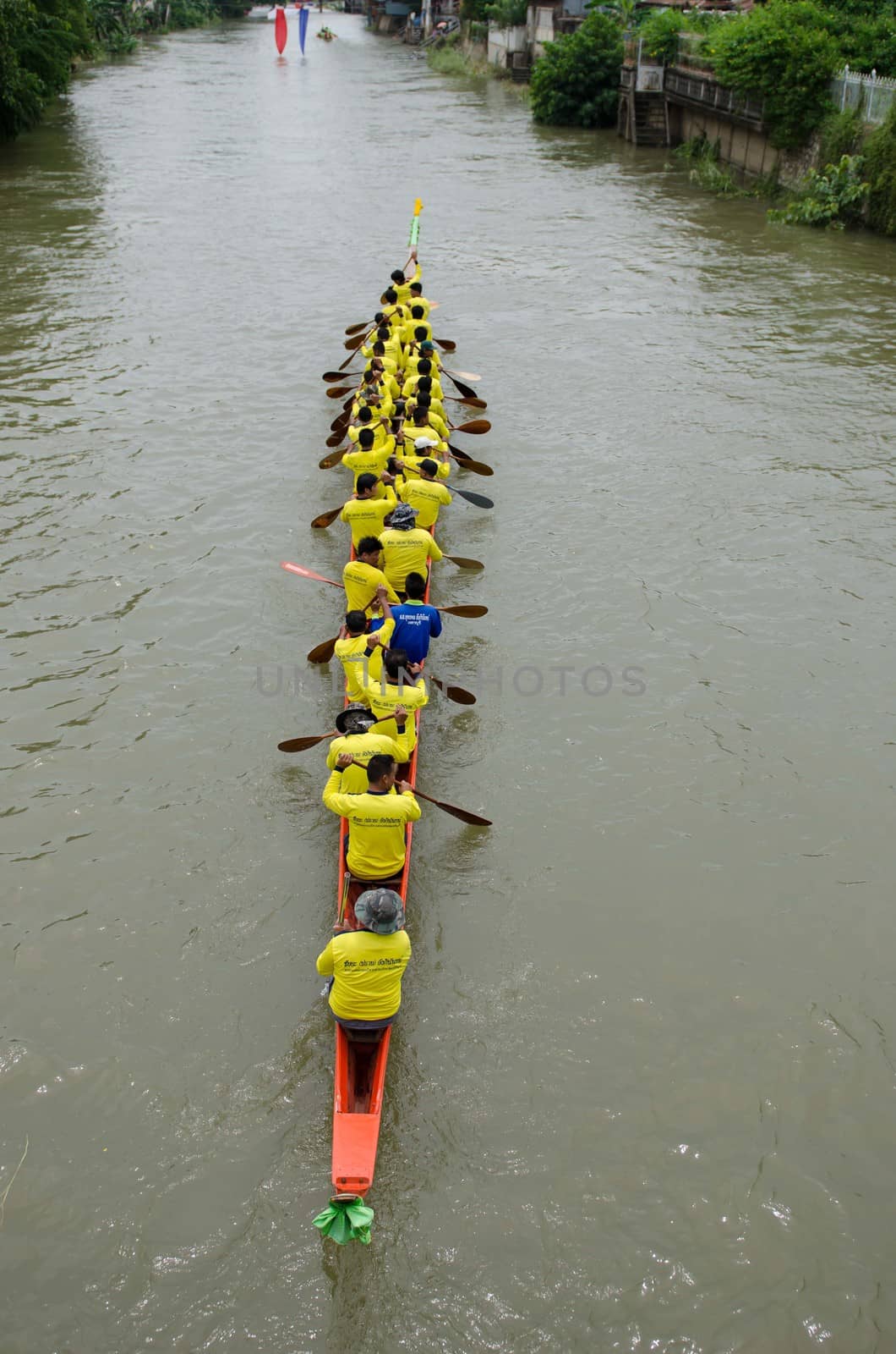 Petchaburi, THAILAND - October 7 : Participants in the Petchaburi Long Boat Competition 2012 on October 7, 2012 in The Petchaburi river ,Petchaburi Province, Thailand. 