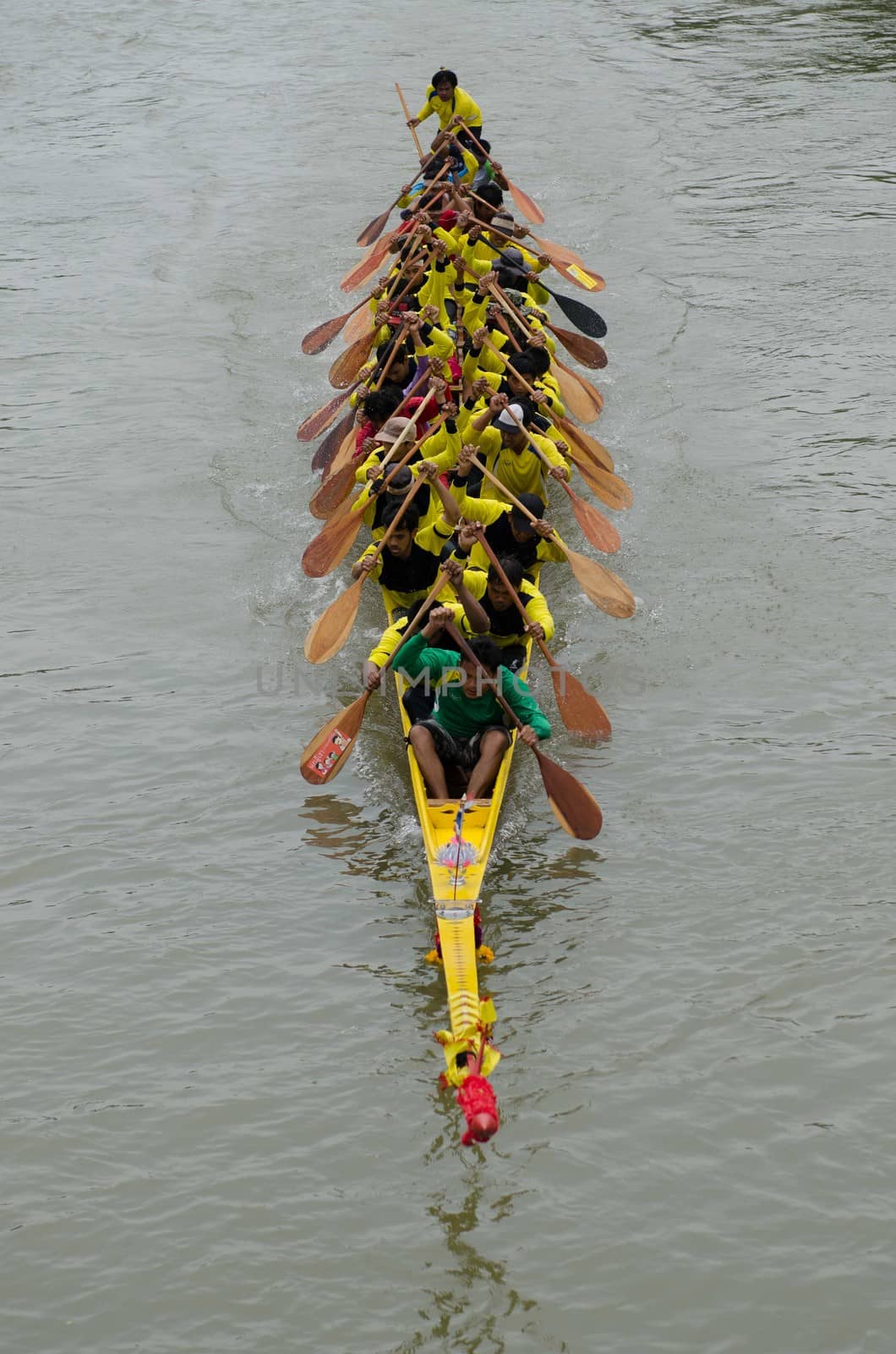 Petchaburi, THAILAND - October 7 : Participants in the Petchaburi Long Boat Competition 2012 on October 7, 2012 in The Petchaburi river ,Petchaburi Province, Thailand. 