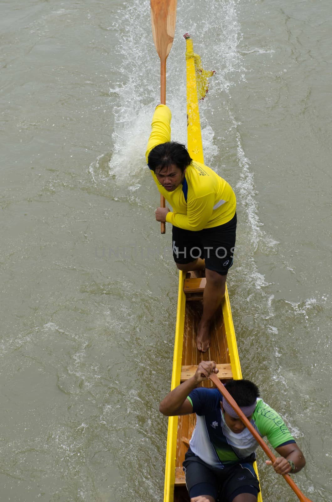 Petchaburi, THAILAND - October 7 : Participants in the Petchaburi Long Boat Competition 2012 on October 7, 2012 in The Petchaburi river ,Petchaburi Province, Thailand. 