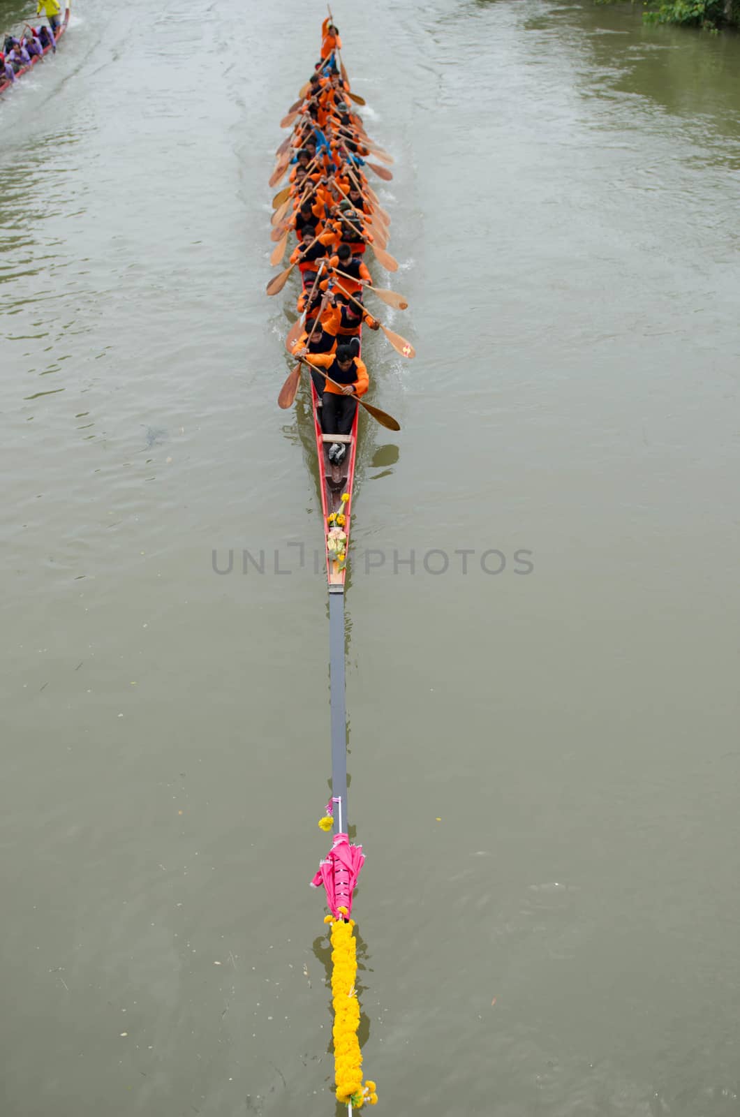 Petchaburi, THAILAND - October 7 : Participants in the Petchaburi Long Boat Competition 2012 on October 7, 2012 in The Petchaburi river ,Petchaburi Province, Thailand. 