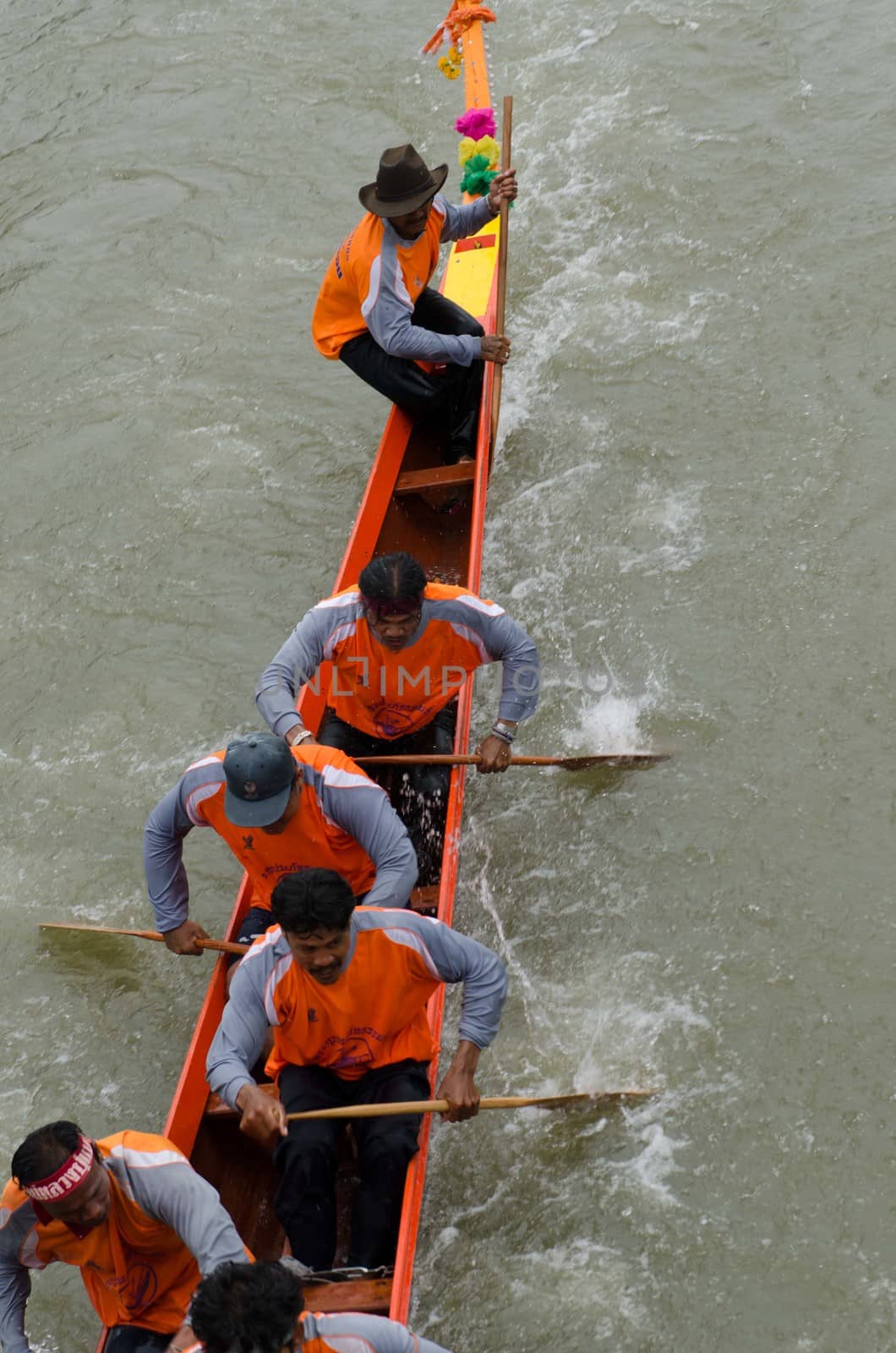 Petchaburi, THAILAND - October 7 : Participants in the Petchaburi Long Boat Competition 2012 on October 7, 2012 in The Petchaburi river ,Petchaburi Province, Thailand. 