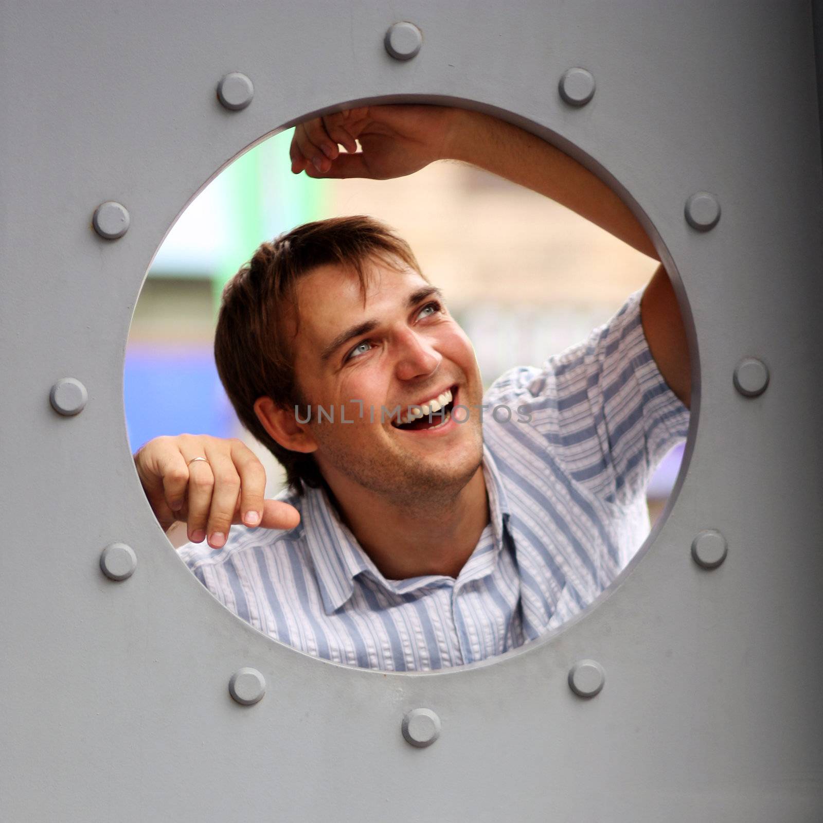 Portrait of young attractive man, outdoors