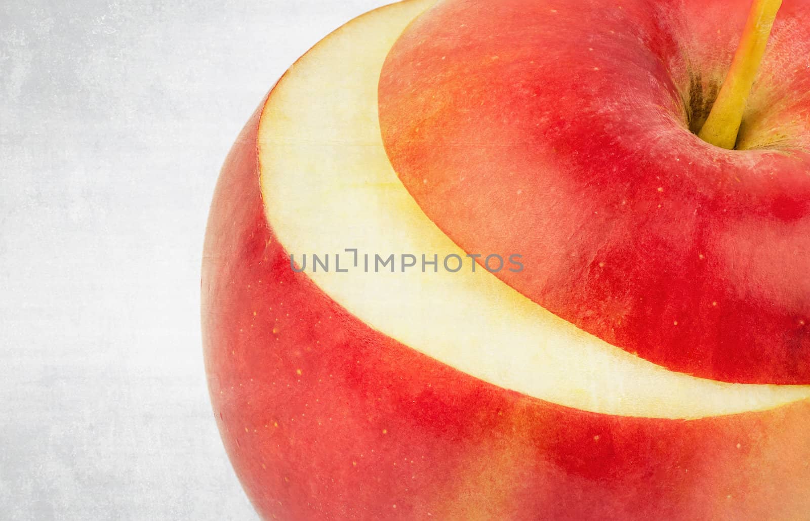 textured old paper background with fresh red apple by Zhukow