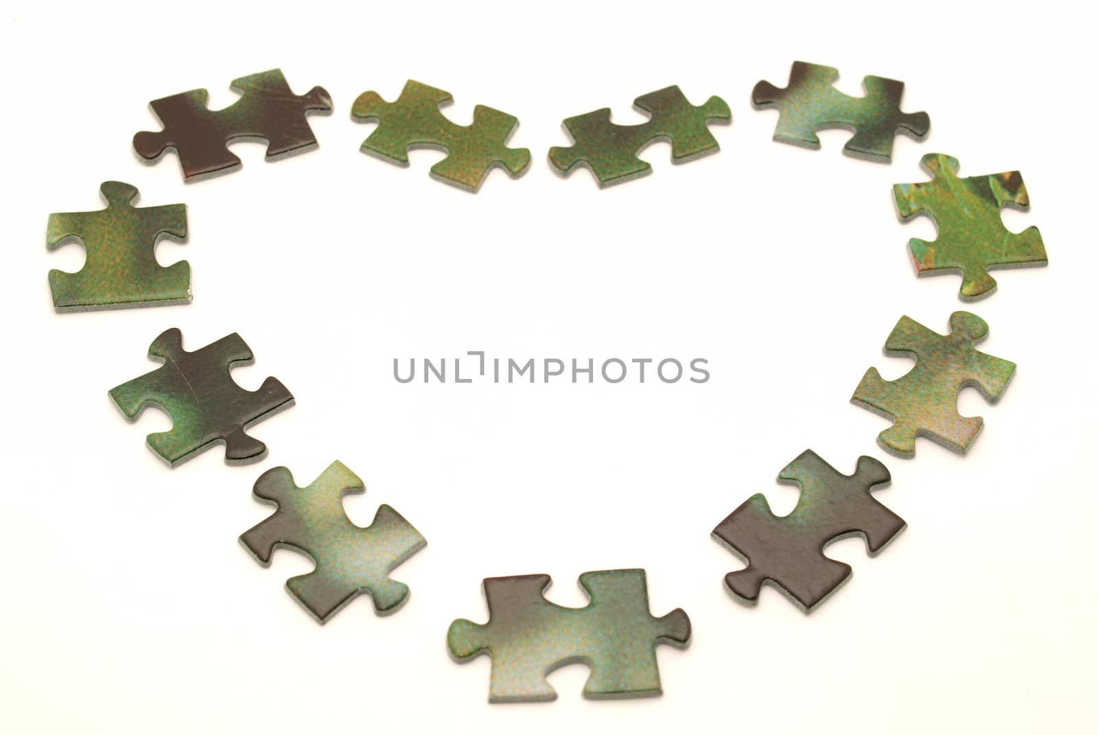 Heart. Puzzle pieces on a white background         