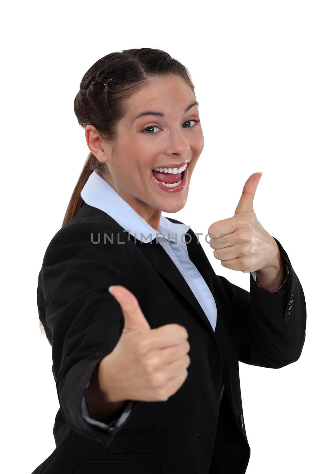 Businesswoman with thumbs up by phovoir