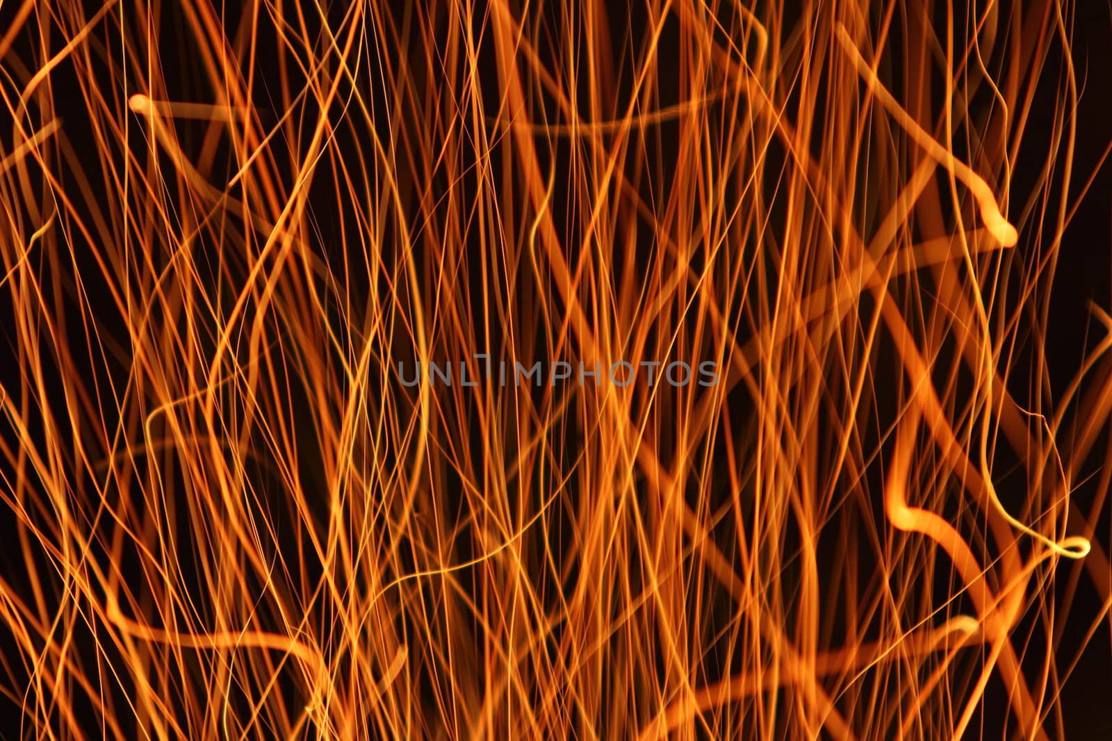 sparks from a fire light trail