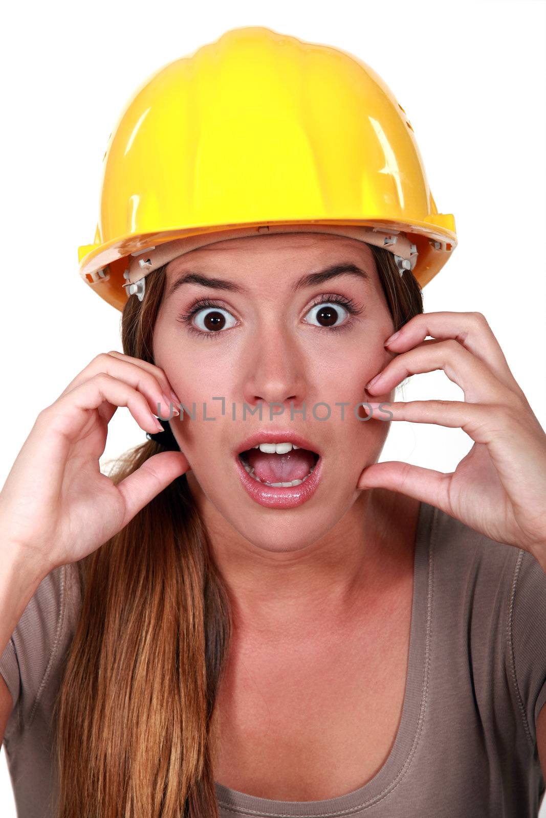A horrified female construction worker.