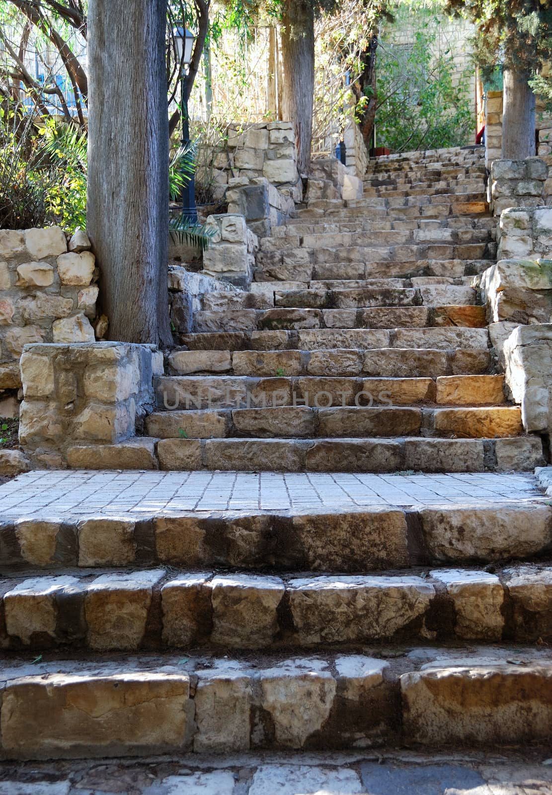 Old stone stairs leading up. Rosh Pinna, Israel.