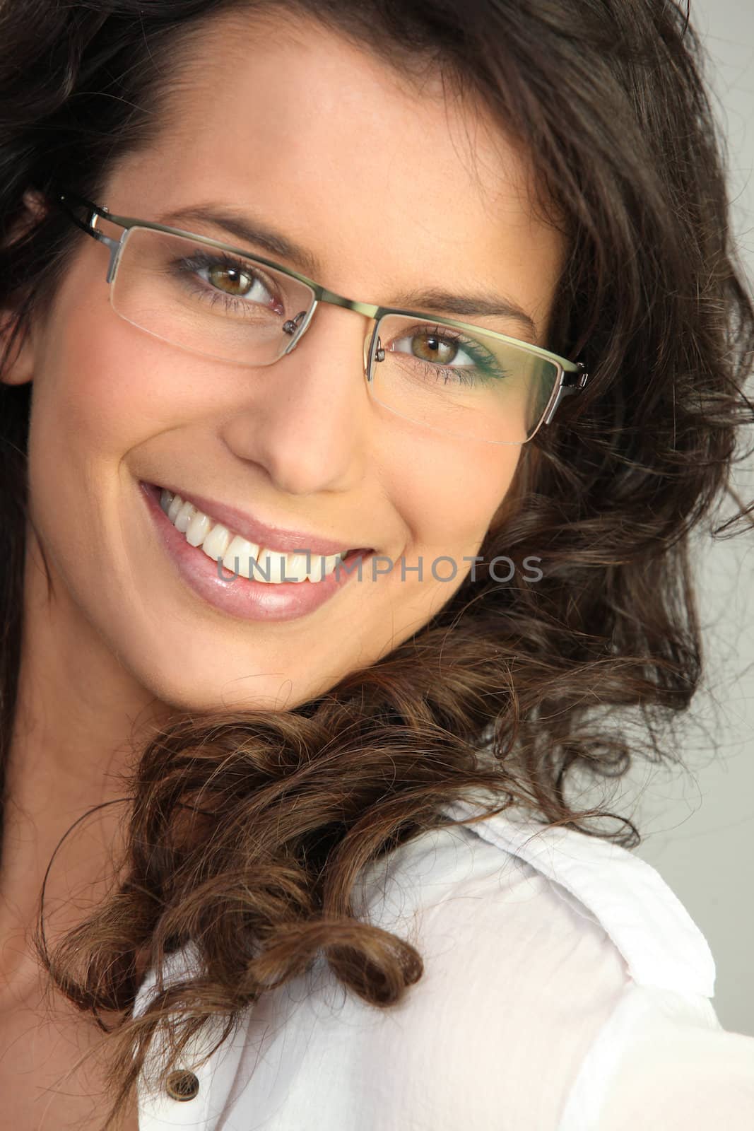 Pretty brunette wearing glasses