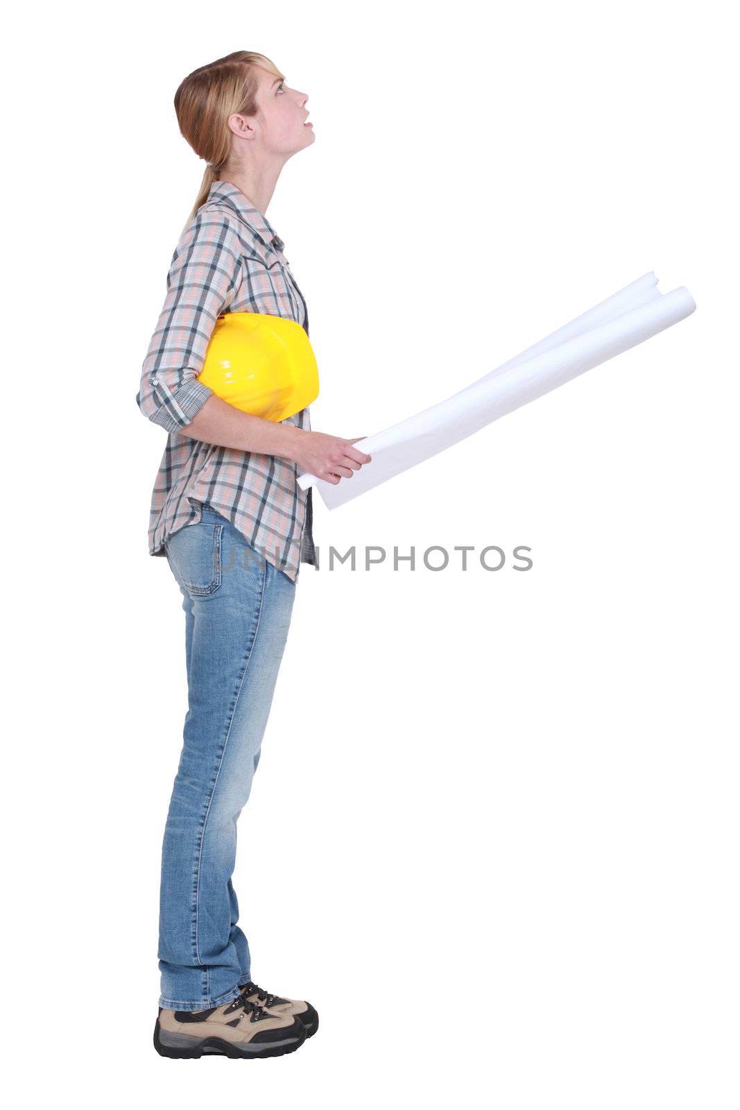 Woman with building plans by phovoir