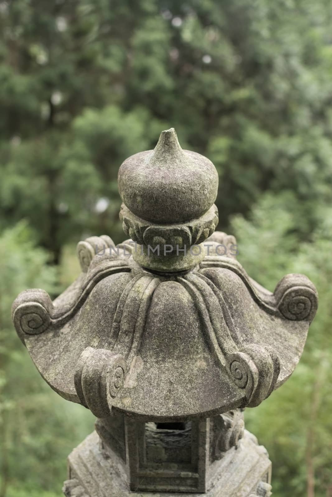 Traditional asian stone lantern by elwynn
