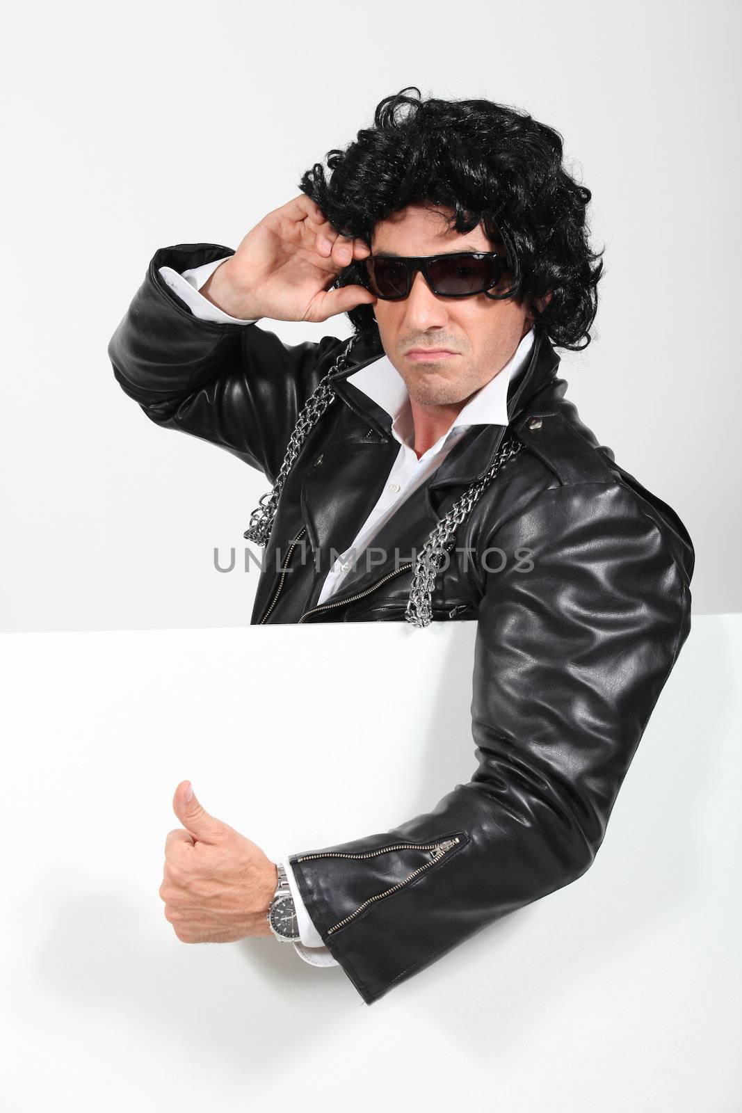 Man dressed as a rockstar by phovoir